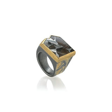 Sliced meteorite (Esquel) set in 22k and 24k yellow gold. Ring is 3/4" wide (20mm) and is a size 10.