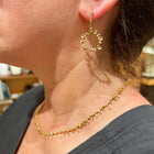 hinged earrings with shell drops