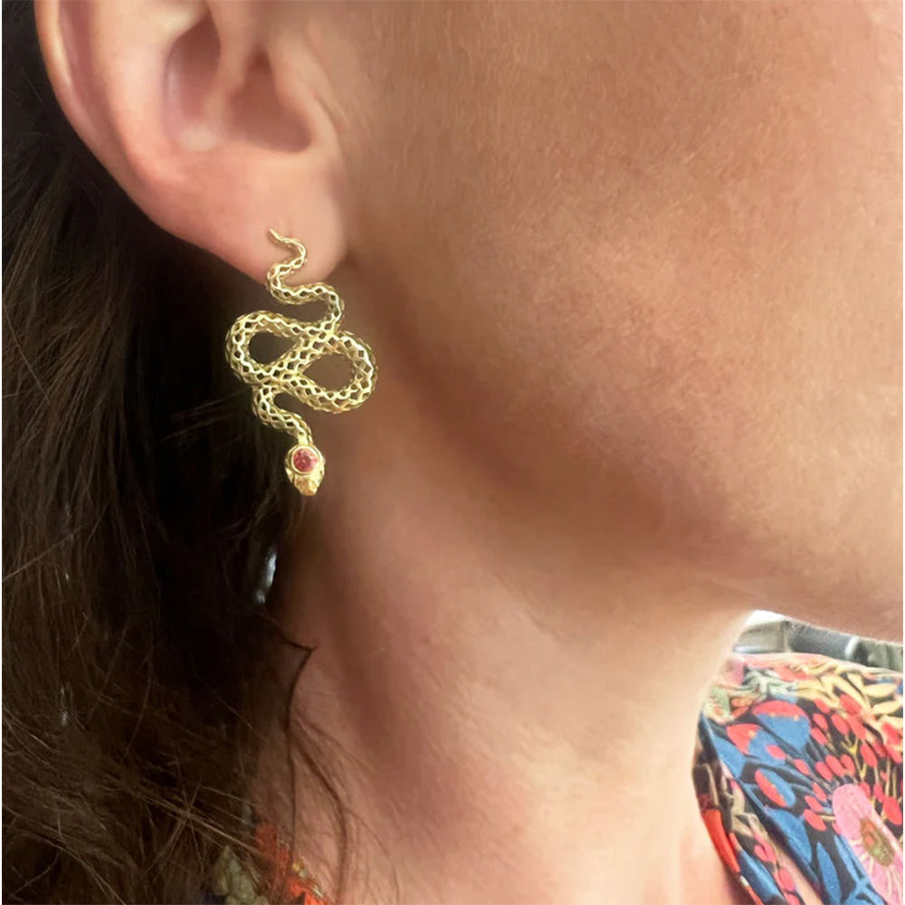 snake earrings with red sapphires