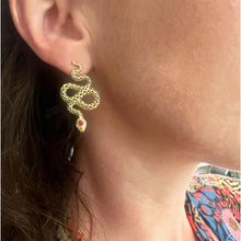 snake earrings with red sapphires