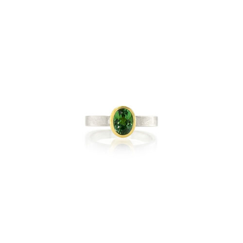 Oval faceted green tourmaline ring, 8mm x 5mm, set in 22k yellow gold on a square sterling silver ring shank, 3mm wide, ring size 6.75.
