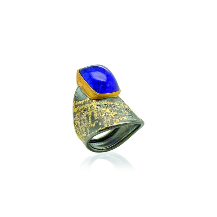 Tanzanite cabochon ring with diamonds