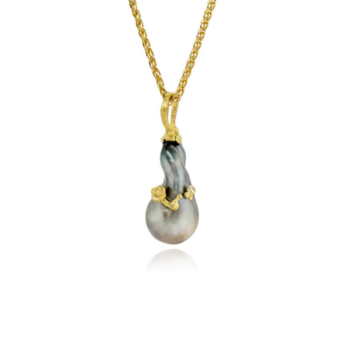 Elongated Tahitian pearl pendant with snail