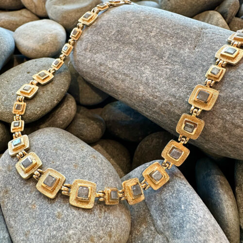 hinged necklace with square grey diamonds