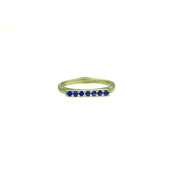 Corazon stacking ring with blue sapphires set in 18k Fairmined green gold