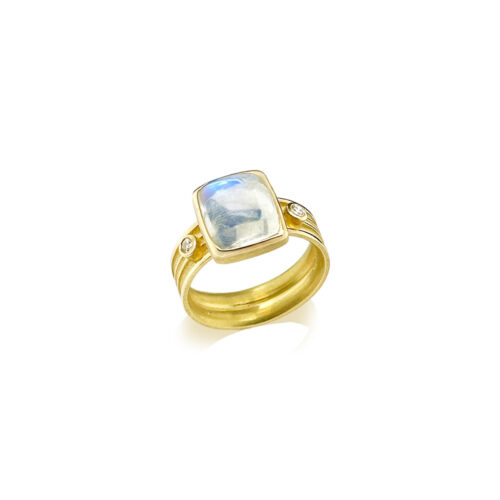 Cushion shaped moonstone cabochon and diamond ring