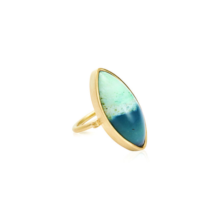 Petrified opalized wood ring set in 18K yellow gold. Ring measures 1 5/16" long x 5/8" wide (33 x 16mm) and is a size 6
