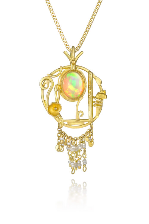 "First Light" pendant with Ethipian opal and antique seed pearl tassels in 24k, 22k and 18k yellow gold. Pendant is 1 13/16" long x 1" wide (46 x 25mm).