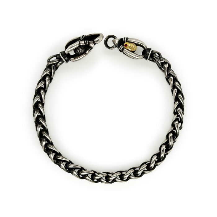 Oxidized sterling silver wheat chain; 6mm and custom made locking links; 18k gold and one ruby on hallmark. Bracelet is 9" long x 1/4" wide.