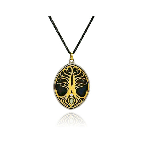 Oxidized sterling silver and 18k yellow gold "Tree of Life" pendant with one pear shaped natural colored chocolate diamond, 0.05cts, on a oxidized sterling silver chain. Chain is 16" long with a lobster clasp and pendant is 40mm long x 19mm wide.