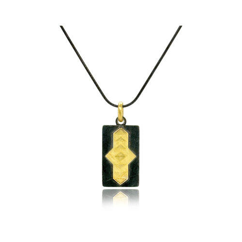 Oxidized sterling silver and 18k yellow gold "Arrow" tag pendant on an oxidized sterling silver chain. Chain is 18" long with a lobster clasp and arrow is 1 1/2" L x 5/8" W (38 x 15mm).