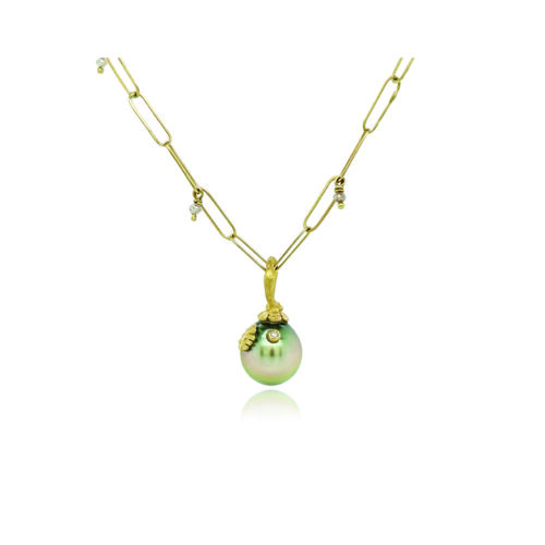 Blue-grey Tahitian pearl pendant with hand-fabricated 18k gold flower bail, oak leaf and white diamond, 0.01ct. Pendant is 7/8"L x 7/16" diameter. ***CHAIN SOLD SEPARATELY***