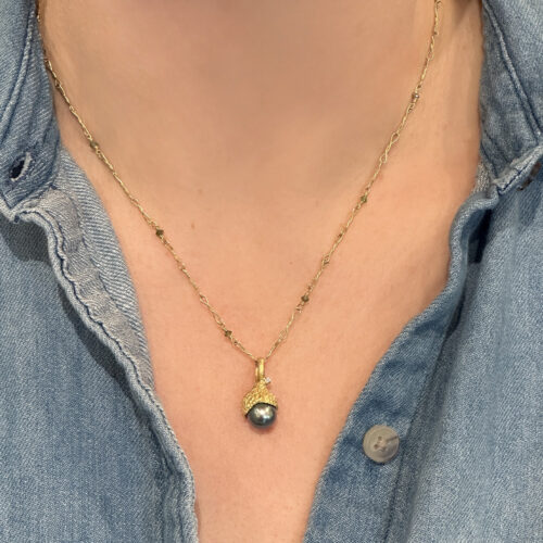 Grey Tahitian pearl pendant with hand-fabricated acorn top and bail with white diamond, 0.01ct. Pendant is 7/8" L x 3/8" diameter. ***CHAIN SOLD SEPARATELY***