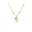 South Seas white pearl pendant in 18k yellow gold with hand-fabricated bird, white diamond, 0.01ct and flower bail. Pendant is 1" L x 1/2" diameter. ***CHAIN SOLD SEPARATELY***