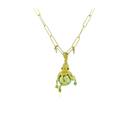 18k yellow gold, hand-fabricated octopus pendant with green diamonds, 0.09cttw and green diamond beads on a blue-grey Tahitian pearl. Pendant is 1 1/4" L x 5/8" diameter (32 x 16mm). ***CHAIN SOLD SEPARATELY***