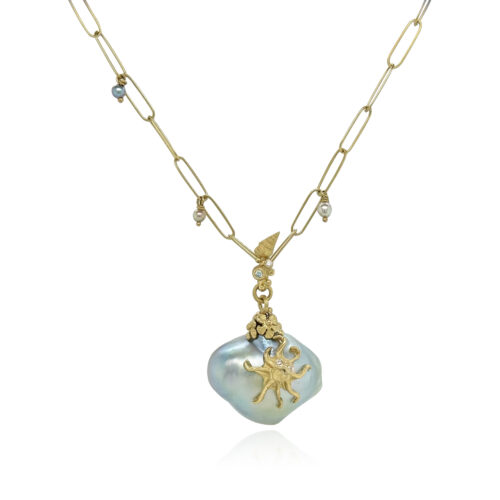 "Sea shore" pendant with a large blue Tahitian pearl, hand-fabricated 18k yellow gold octopus, seashell, flowers and bail with a blue diamond, 0.01ct, and white diamonds, 0.02cttw. Pendant is 1 5/8" long x 1" wide. ***CHAIN SOLD SEPARATELY***