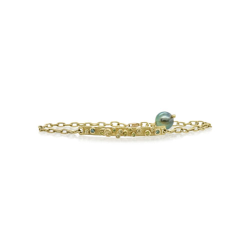 18k yellow gold bar bracelet with hand-fabricated snail, colored diamonds, 0.18cttw and grey Tahitian pearl. Bar is 38mm long. Bracelet is 7 1/2" long with a lobster clasp.