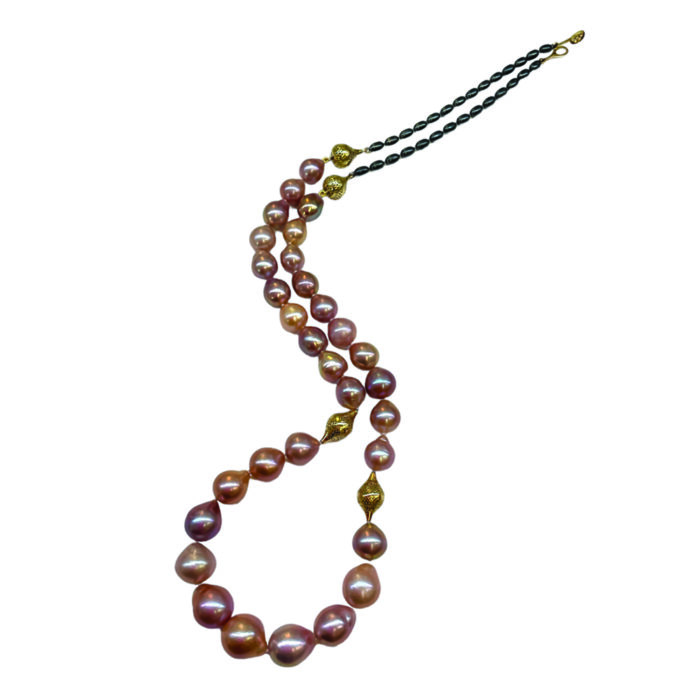 Natural multicolored baroque fresh water pearls, 10-15mm diameter, with two small 18k yellow gold crownwork finials and two amphoras on oxidized silver chain with a lilypad clasp. Necklace is 29.5" long.