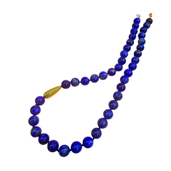 Beaded Tanzanite necklace, 10mm diameter, finished with an 18k yellow gold tapered crownwork link and small lilypad clasp. Necklace is 19" long.