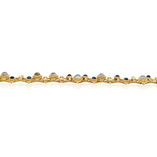 hinged moonstone and sapphire "Music Notes" bracelet