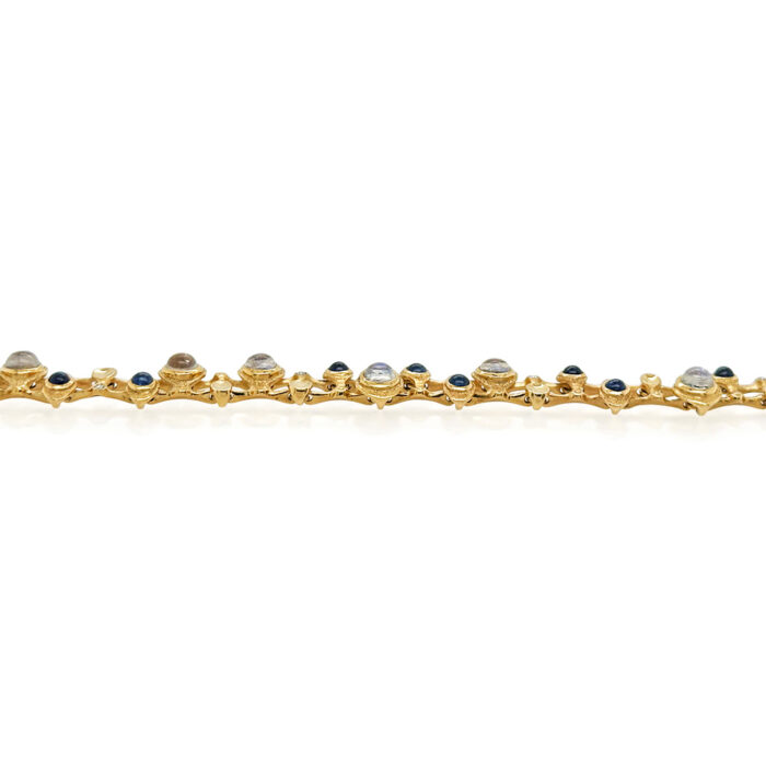 hinged moonstone and sapphire "Music Notes" bracelet
