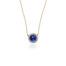Luna Tanzanite round cabochon pendant surrounded by pavé-set diamonds, 0.72 cttw, on 18k yellow gold chain. Tanzanite is 14mm.