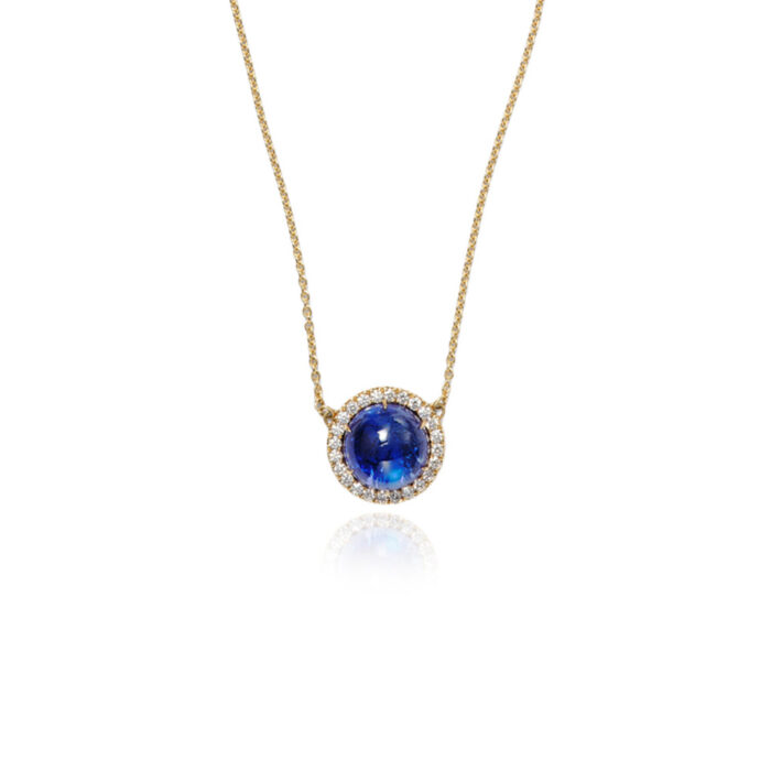Luna Tanzanite round cabochon pendant surrounded by pavé-set diamonds, 0.72 cttw, on 18k yellow gold chain. Tanzanite is 14mm.