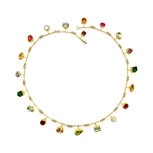 segment necklace with multi-colored gems