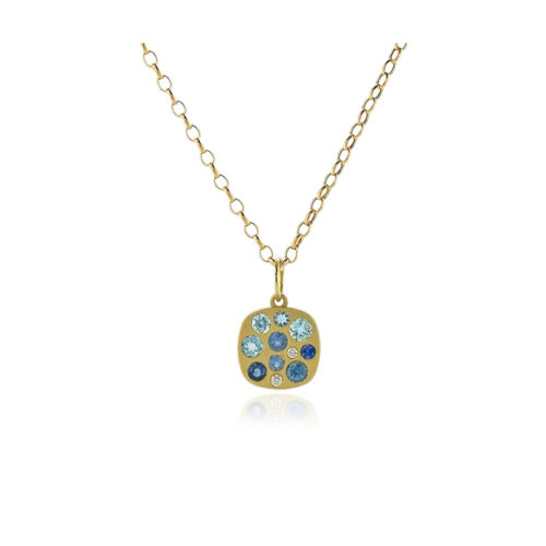 "Giselle" necklace with aquamarines, .26 ctttw, and blue sapphires, .38 cttw, on a 17" long 18k yellow gold chain with lobster clasp. 