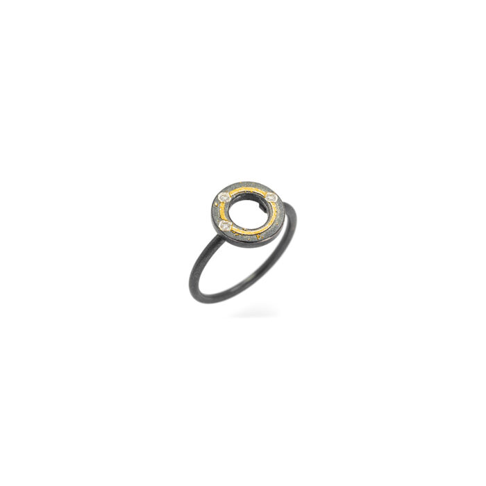 Oxidized sterling silver and 24k yellow gold "X" shaped ring with white (G) vs diamonds, 0.04 cttw. Ring is 3/8" in diameter (10mm) and is a size 5.