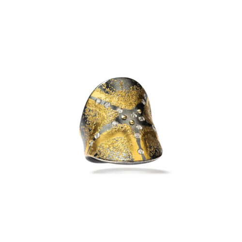 "Star" ring in oxidized sterling silver, 18k and 24k yellow gold, with scattered white (G) diamonds, vsi, 0.15 cttw. Ring is 26mm (1 1/16") at its widest and is a size 9.5.