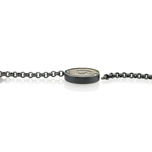 Round Vario clasp in oxidized sterling silver and 12k white gold, with white (G) diamonds, vsi, 0.18 cttw. Clasp is 27mm (1 1/8") diameter and 6mm high.