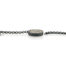 Round Vario clasp in oxidized sterling silver and 12k white gold, with white (G) diamonds, vsi, 0.18 cttw. Clasp is 27mm (1 1/8") diameter and 6mm high.