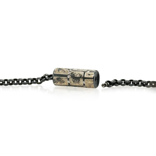 Vario spring style clasp with oxidized sterling silver, 12k yellow gold, and white (G) diamonds vsi, 0.23 cttw. Clasp is to be used with Vario style chains or strands, and is 1.1" long with a diameter of 0.4".