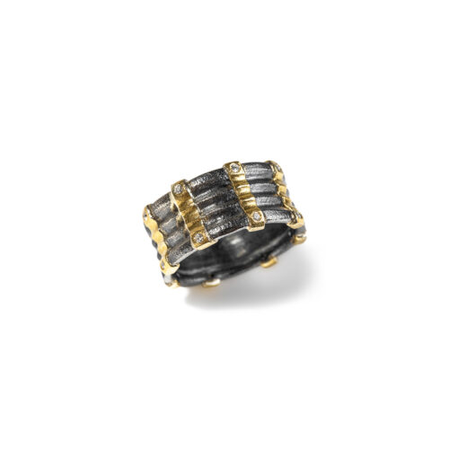 Layered oxidized sterling silver ring with 22k yellow gold vertical stripes and white (G) diamonds, 0.16 cttw. Ring is 7/16" wide and is a size 9.