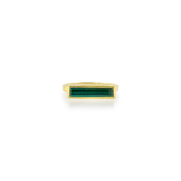 East/West rectangular blue tourmaline, 1.86 cts, set in 22k and 18k yellow gold. Ring is a size 6.75.