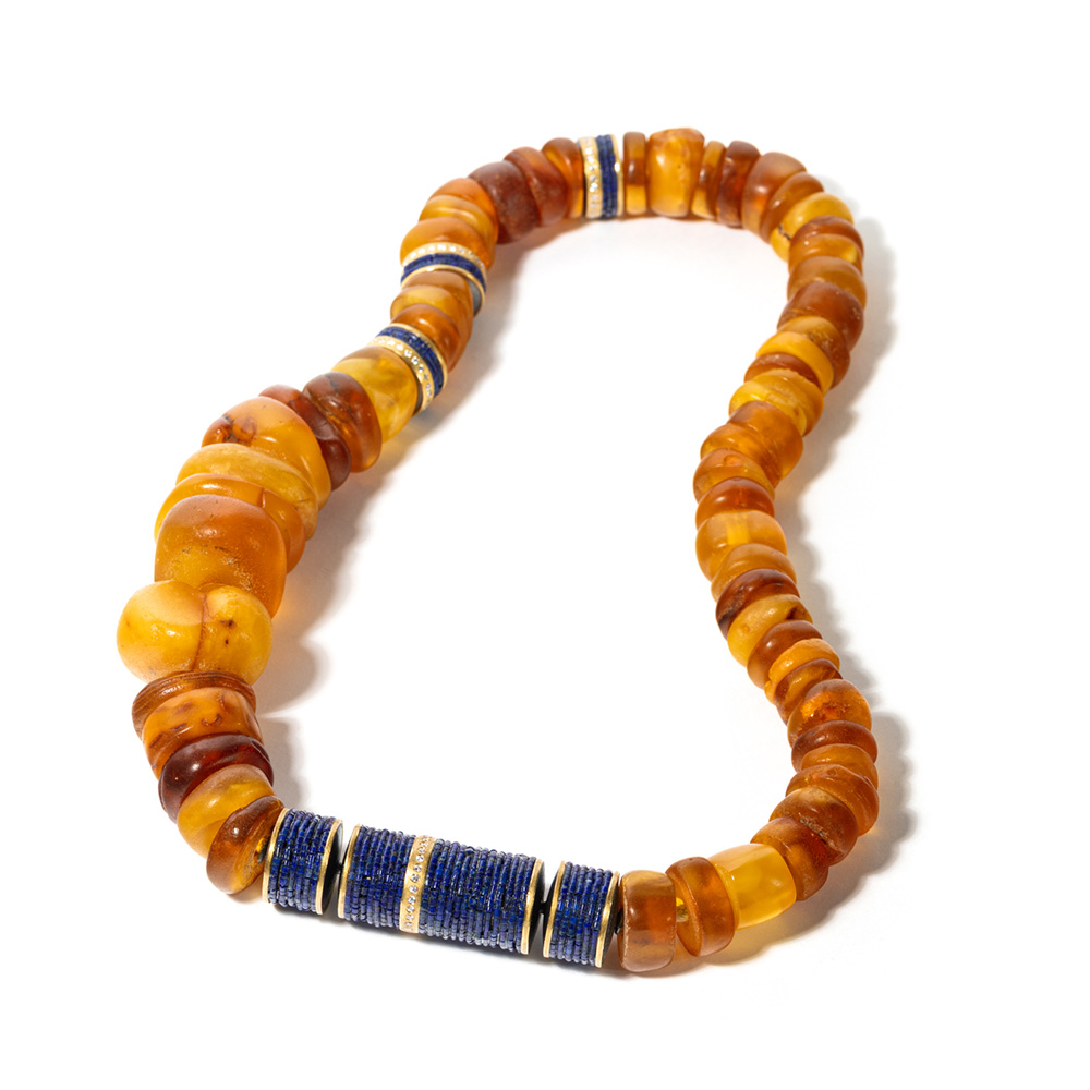 Amber, lapis lazuli, and beads created from oxidized sterling silver, 22k yellow gold and vs diamonds, 1.10cttw Vario clasp. Length of necklace is 23.4".
