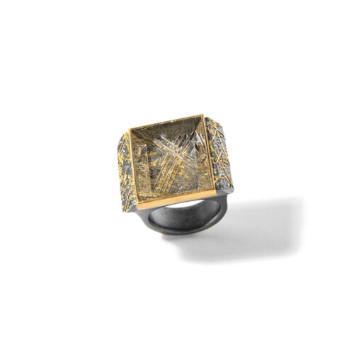 Oxidized sterling silver ring shank with a Munsteiner-cut rutilated quartz, 38.61cts, set in 22k and 24k yellow gold with vs white diamonds, 0.22cttw.