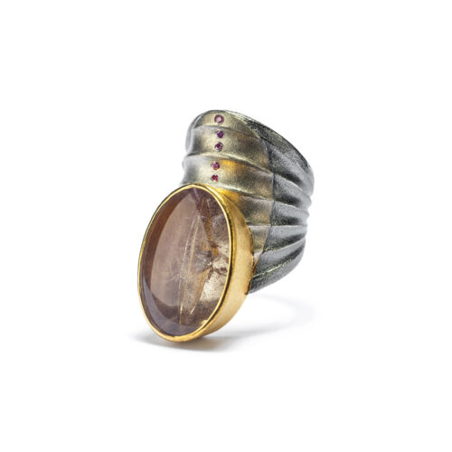 Munsteiner cut quartz, 16.98 cts, with purple mica inclusions and pink diamonds, 0.05 cttw, set in 18k yellow gold on a wide oxidized sterling silver and platinum band that is 1 1/2" wide (38mm) and tapers down to 8mm. Ring is a size 8.
