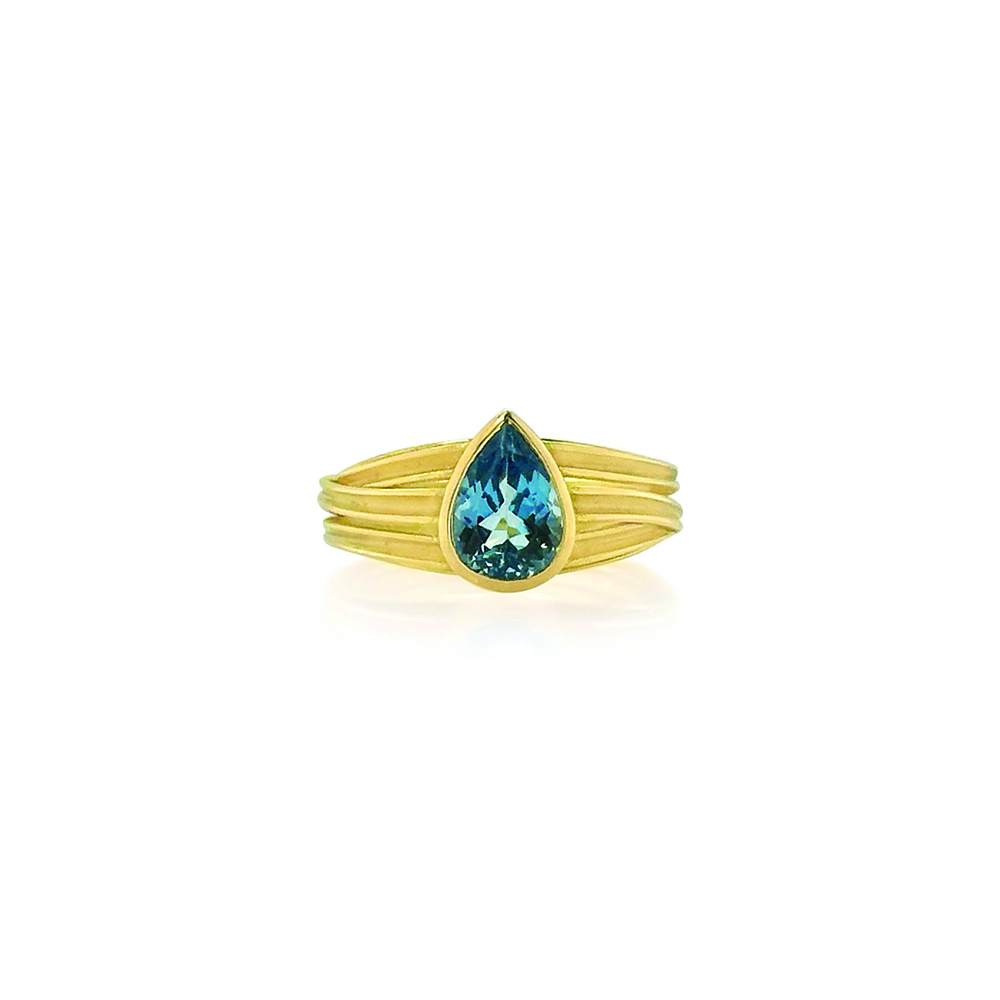 Pear-shaped aquamarine ring, 1.34 cts, on a 18k yellow gold double tier three ribbon band. Ring is a size 6.75.
