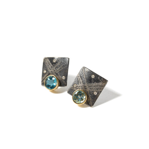 Earrings in 22k + 18k gold, oxidized sterling silver, round aquamarines, 1,88cttw, vsi white diamonds, 0,06 cttw, post backs. Earrings are 5/8" W x 3/4" L (17 x 19mm).