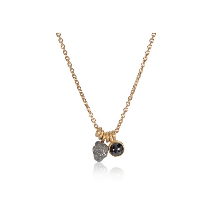 18k yellow gold necklace with a natural rough diamond sphere, 3.65 cts, and a rose-cut black diamond, 0.80 cts, on an 18k yellow gold 16" long chain.