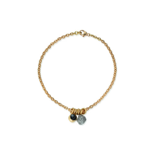 18k yellow gold bracelet with rough diamond sphere,5.2mm, 2.50cts, and rose-cut black diamond, 7mm, 1.31 cts, on a 18cm chain with a lobster clasp.