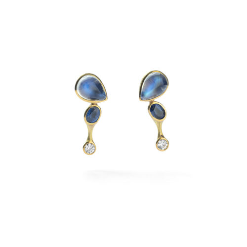 Earrings in 18K gold with blue flash moonstones, 5.67 cttw, unheated blue sapphires, 1.43 cttw, white (G) brilliant cut diamonds, 0.50 cttw, with post backs. Earrings are 1" L x 1/2" W (26 x 13mm).