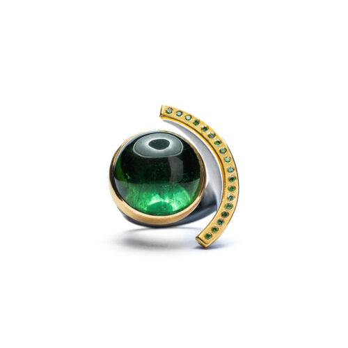 Large green tourmaline ring with a green diamond collar, set in sterling sterling silver, 22K gold, tourmaline 38.88 cts, green diamonds, 0.18cttw. Ring is size 8 and is 1 3/8" wide (35mm).