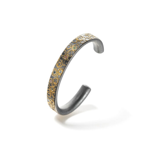 Oxidized sterling silver cuff with 24k yellow gold "bubbles", fancy colored diamonds, 0.09cttw, size small. Cuff is 5/16" W, (8mm). Interior dimension of cuff is 5.75".