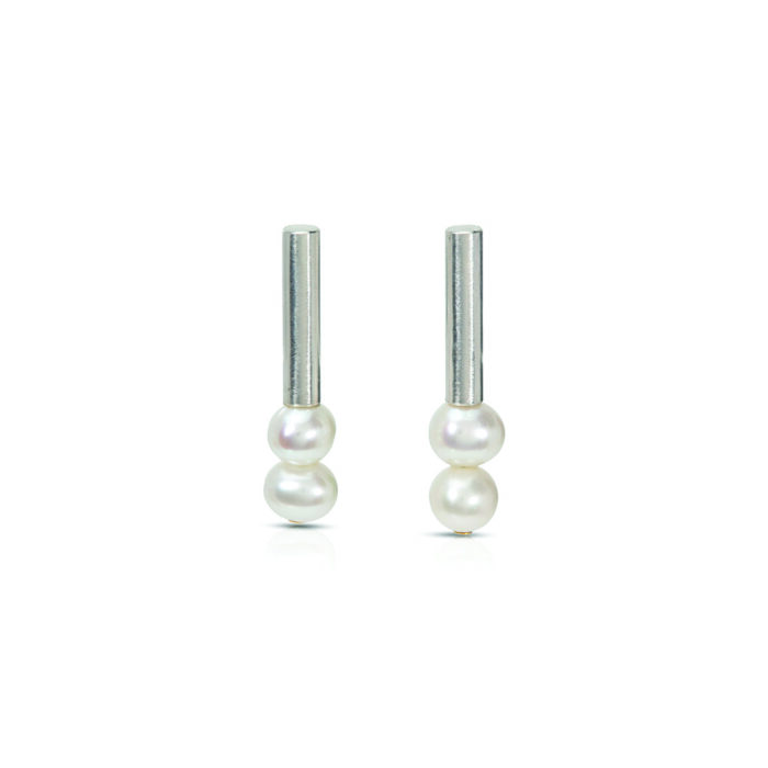 Sterling silver vertical tube earrings with freshwater pearls, 5-6.5mm diameter, and a 24k yellow gold rivet.