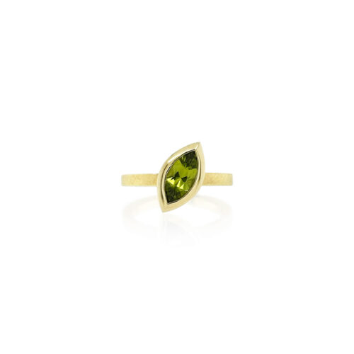 One-of-a-kind marquise cut Arizona peridot ring in 14k yellow gold. Peridot is 10 x 5 mm and ring is a size 6. 