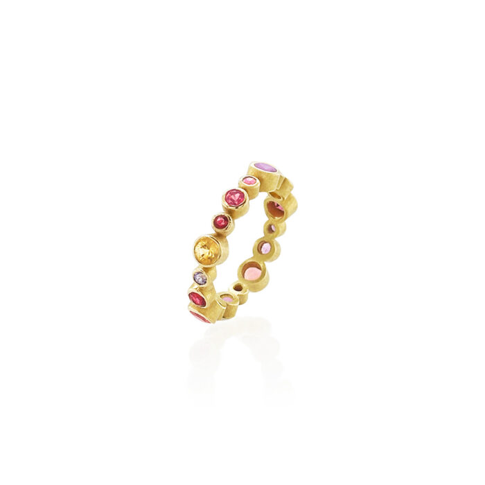 18k yellow gold ring with multi-color (pink and purple) sapphires, 1.75 cttw, and rubies, 0.06 cttw. Sapphires range in size from 1.9-3.75 mm and ring is a size 6.5. 