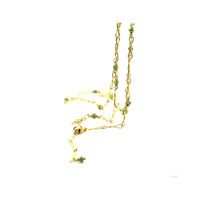 Adjustable twisted popsicle necklace in 18k yellow gold with green diamond beads and a lobster clasp. Necklace is 18" long.